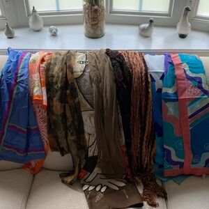 Nine silk scarves. Some never worn and some lightly loved.